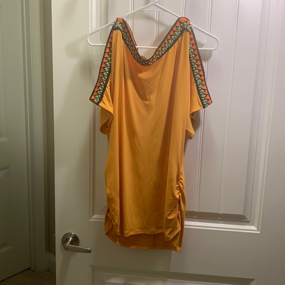 Tops - yellow top with black/orange/turquoise design on border of sleeves & neckline